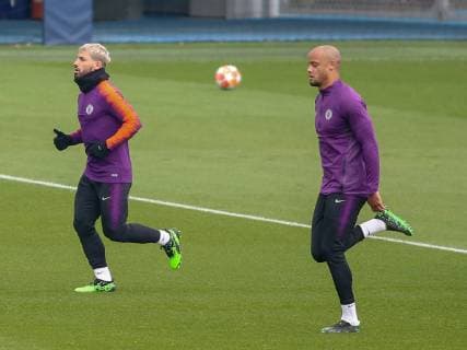 Manchester City Training Sergio Aguero (left) and Vincent Kompany during Manchester City training at the Etihad Campus, Manchester Content Not Available For UK Newspapers Copyright: xStevexMcCormickx FIL-13122-0003
