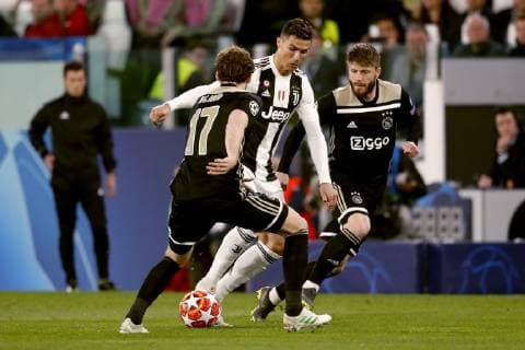 TORINO, Football,16-04-2019, Allianz Stadium . Champions League quarter finals second leg Juventus - Ajax. Ajax player Daley Blind (L) and Ajax player Lasse Schone (R) and Juventus player Cristiano Ronaldo (C) during the game Juventus - Ajax . Juventus - Ajax  x3199545x