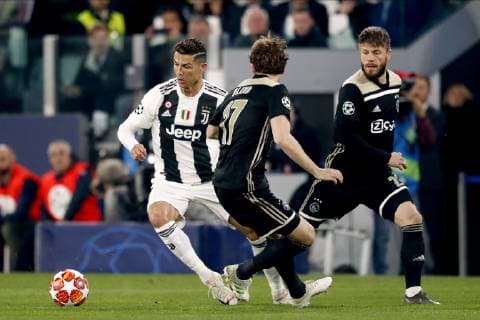 TORINO, Football,16-04-2019, Allianz Stadium . Champions League quarter finals second leg Juventus - Ajax. Juventus player Cristiano Ronaldo (L) and Ajax player Daley Blind (C) and Ajax player Lasse Schone (R) during the game Juventus - Ajax . Juventus - Ajax  x3199724x