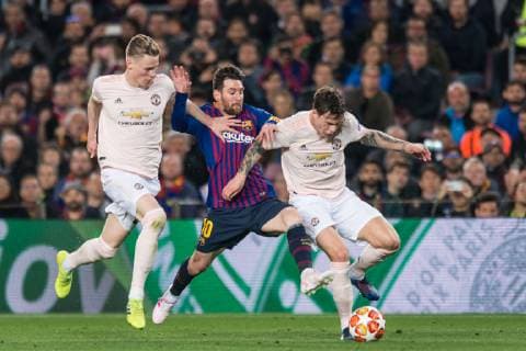 Barcelona Spain 16 04 2019 UEFA Champions League 2018 19 Season Quarter Final 2 Round FC Barcelona Manchester United Scott McTominay Manchester United Lionel Messi Barcelona and Victor Lindelof Manchester United battle for the ball DeFodi059