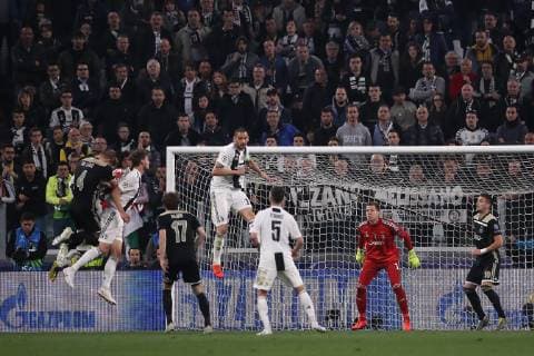 Matthijs de Ligt of Ajax climbs highest to head his side into a 2-1 lead during the UEFA Champions League match at Allianz Stadium, Turin. Picture date: 16th April 2019. Picture credit should read: Jonathan Moscrop Sportimage EDITORIAL USE ONLY. No use with unauthorised audio, video, data, fixture lists, club league logos or live services. Online in-match use limited to 120 images, no video emulation. No use in betting, games or single club league player publications. SPI-0036-0021
