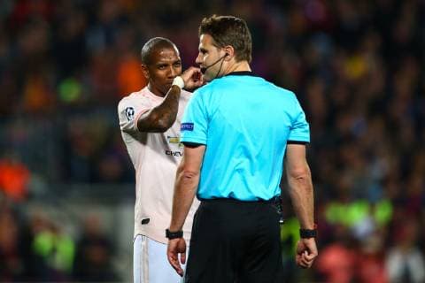 Ashley Young of Manchester United ManU questions Referee Felix Brych during the UEFA Champions League match at Camp Nou, Barcelona. Picture date: 16th April 2019. Picture credit should read: Craig Mercer Sportimage EDITORIAL USE ONLY. No use with unauthorised audio, video, data, fixture lists, club league logos or live services. Online in-match use limited to 120 images, no video emulation. No use in betting, games or single club league player publications. SPI-0042-0081