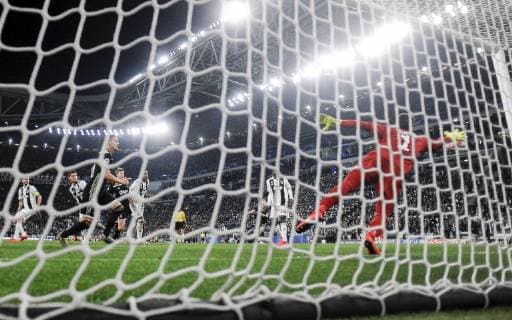 (190417) -- TURIN, April 17, 2019 -- Ajax s Matthijs de Ligt (L) scores during the UEFA Champions League quarterfinal second leg match between FC Juventus and Ajax in Turin, Italy, on April 16, 2019. Ajax won 2-1 and entered the semifinal with a total score of 3-2. ) (SP)ITALY-TURIN-SOCCER-UEFA CHAMPIONS LEAGUE-JUVENTUS VS AJAX AlbertoxLingria 