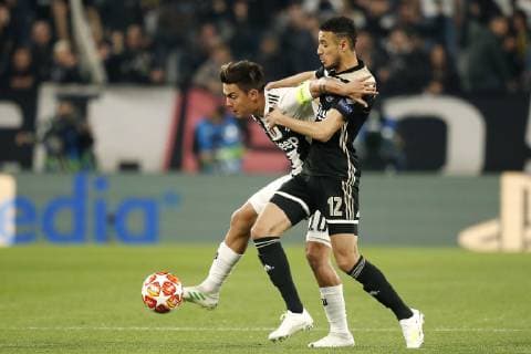 TORINO, Football,16-04-2019, Allianz Stadium . Champions League quarter finals second leg Juventus - Ajax. Juventus player Paulo Dybala (L) and Ajax player Noussair Mazraoui (R) during the game Juventus - Ajax (1-2). Juventus - Ajax x3202338x