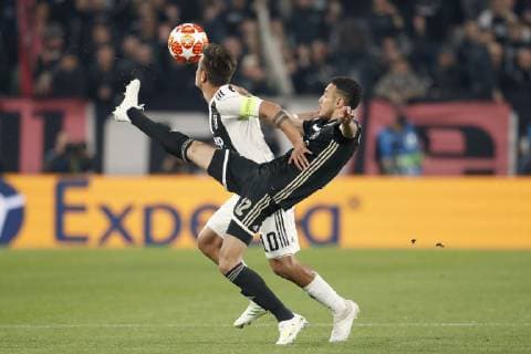 TORINO, Football,16-04-2019, Allianz Stadium . Champions League quarter finals second leg Juventus - Ajax. Juventus player Paulo Dybala (L) and Ajax player Noussair Mazraoui (R) during the game Juventus - Ajax (1-2). Juventus - Ajax x3202339x