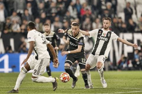 TORINO, Football,16-04-2019, Allianz Stadium . Champions League quarter finals second leg Juventus - Ajax. Ajax player Hakim Ziyech (C) and Juventus player Miralem Pjanic (R) during the game Juventus - Ajax (1-2). Juventus - Ajax x3202356x