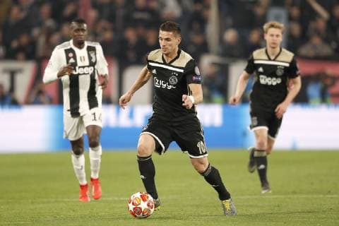 TORINO, Football,16-04-2019, Allianz Stadium . Champions League quarter finals second leg Juventus - Ajax. Ajax player Dusan Tadic (C) on the ball during the game Juventus - Ajax (1-2). Juventus - Ajax x3202360x