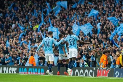 Manchester City v Tottenham Hotspur UEFA Champions League Raheem Sterling of Manchester City celebrates after scoring his sides first goal with Benjamin Mendy of Manchester City (right) and Aymeric Laporte of Manchester City (left) during the second leg of the UEFA Champions League quarter-final match at the Etihad Stadium, Manchester Content Not Available For UK Newspapers Copyright: xMattxWilkinsonx FIL-13126-0019