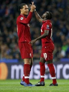 (L-R) Virgil van Dijk of Liverpool FC, Sadio Mane of Liverpool FC during the UEFA Champions League quarter final match between FC Porto and Liverpool FC at Estadio do Dragao on April 17, 2019 in Porto, Portugal UEFA Champions League 2018 2019 xVIxVIxImagesx xMauricexvanxSteenxIVx 14221401