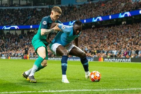 Manchester City v Tottenham Hotspur UEFA Champions League Benjamin Mendy of Manchester City holds off Kieran Trippier of Tottenham Hotspur during the second leg of the UEFA Champions League quarter-final match at the Etihad Stadium, Manchester Content Not Available For UK Newspapers Copyright: xMattxWilkinsonx FIL-13126-0044