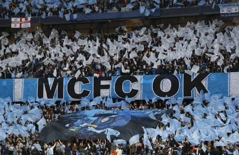 Manchester City fans wave flags during the UEFA Champions League match at the Etihad Stadium, Manchester. Picture date: 17th April 2019. Picture credit should read: Darren Staples Sportimage EDITORIAL USE ONLY. No use with unauthorised audio, video, data, fixture lists, club league logos or live services. Online in-match use limited to 120 images, no video emulation. No use in betting, games or single club league player publications. SPI-0043-0024