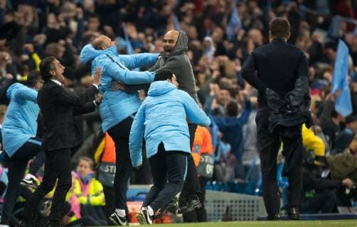 Man City Manager Pep Guardiola celebrates as he thinks his team have won late in the game only for a VAR decision top go against them as Spurs Manager Mauricio Pochettino takes his coat off during the UEFA Champions League QF 2nd leg match between Manchester City and Tottenham Hotspur at the Etihad Stadium, Manchester, England on 17 April 2019. Copyright: xAndyxRowlandx PMI-2761-0028