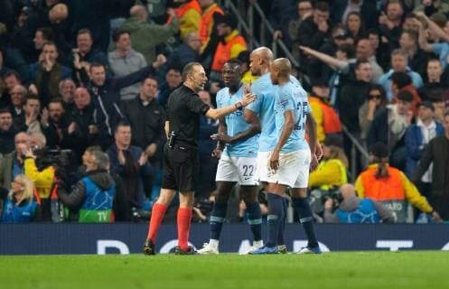 Manchester City v Tottenham Hotspur UEFA Champions League Manchester City players question referee Cuneyt Cakir over a goal by Fernando Llorente of Tottenham Hotspur (4-3) during the second leg of the UEFA Champions League quarter-final match at the Etihad Stadium, Manchester Content Not Available For UK Newspapers Copyright: xRussellxHartx FIL-13127-0066