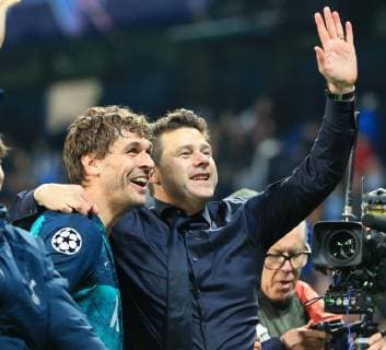 17th April 2019, Etihad Stadium, Manchester, England; UEFA Champions League football, quarter final 2nd leg, Manchester City versus Tottenham Hotspur; match winning goal scorer Fernando Llorente of Tottenham Hotspur and Tottenham Hotspur manager Mauricio Pochettino celebrate in front of the visiting fans after the final whistle  ActionPlus12125061 DavidxBlunsden