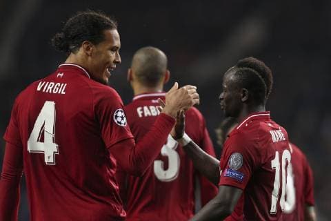 April 17, 2019 - Porto, Porto, Portugal - Virgil Van Dijk defender of Liverpool (L) celebrates after scoring a goal with Sadio Mane midfielder of Liverpool (R) during the UEFA Champions League, match between FC Porto and Liverpool, at Dragao Stadium in Porto on April 14, 2019. Porto v Liverpool - UEFA Champions League Quarter Final: Second Leg  - ZUMAn230 20190417_zaa_n230_527 Copyright: xDpix