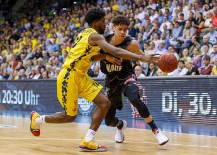 Oldenburg Lower Saxony DEU 20 04 2019 Joshua Obiesie right s Oliver Würzburg and Frantz Massenat left EWE Baskets Oldenburg EWE Baskets Oldenburg vs s Oliver Würzburg Basketball 1 Basketball Bundesliga Season 2018 2019 29 Matchday Great EWE Arena EWE Baskets Oldenburg vs s Oliver Würzburg