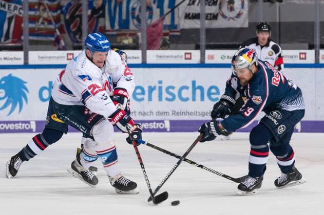 Denis Reul Adler Mannheim and John Mitchell EHC Red Bull Munich in the 2 Final Encounter of the DEL Playoffs between the EHC Red Bull Munich and the Adler Mannheim German Ice Hockey League Playoffs Final Game 2 EHC Red Bull Munich against Adler Mannheim 20 04 2019 Olympic Stadium Munich Munich Munich Copyright: xEIBNER Heike_Feinerx EP_HFR