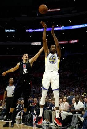 April 21, 2019 - Los Angeles, California, U.S - Golden State Warriors Kevin Durant (35) shoots while defended by Los Angeles Clippers Landry Shamet (20) during an NBA Basketball Herren USA basketball playoffs round one game between Los Angeles Clippers and Golden State Warriors Sunday, April 21, 2019, in Los Angeles. The Warriors won 113-105. NBA 2019 Playoffs: Warriors 113:105 Clippers - ZUMAc68_ 20190421_zaf_c68_006 Copyright: xRingoxChiux