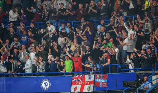 Chelsea v Burnley Premier League Burnley fans celebrates after their team score during the Premier League match at Stamford Bridge, London Content Not Available For UK Newspapers Copyright: xRomenaxFogliatix FIL-13157-0017