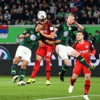 Goncalo Paciencia Eintracht Frankfurt vs. Marcel Tisserand li and Maximilian Arnold VfL Wolfsburg 1 Soccer Bundesliga 2018 2019 VfL Wolfsburg vs. Eintracht Frankfurt in the Volkswagen Arena in Wolfsburg Action Germany Soccer Man Men 22 04 2019 According to the specifications of the DFL Deutsche Fußball Liga is prohibited from using or having used photographs taken in the stadium and or from the match in the form of sequence images and or video-like photo sequences DFL regulations prohibit any use of photographs as image sequences and or quasi video