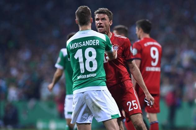 Football DFB Cup Semifinals SV Werder Bremen FC Bayern Munich on 24 04 2019 at Weser Stadium in Bremen Niklas Moisander Bremen front Thomas Müller Munich back DFB regulations prohibit any use of photographs as image sequences and or quasi video xRx