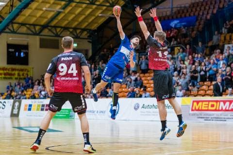 Jonas Hoenicke 20 Dessau Rosslauer HV 06 on the ball Luca de Boer 19 HSG Nordhorn Lingen Georg Pöhle 94 during the match in the Handball 2 Bundesliga Men Season 2018 2019 between Dessau Rosslauer HV 06 and HSG Nordhorn Lingen in the Anhalt Arena on 26 April 2019 in Dessau Rosslau Sachsen Anhalt Germany