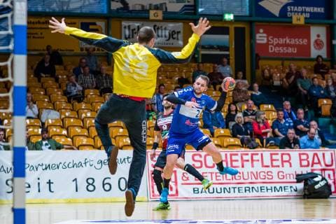 Thomas Pavlicek 2 Dessau Rosslauer HV 06 Bjoern Buhrmester 12 HSG Nordhorn Lingen during the match in Handball 2 Bundesliga Men Season 2018 2019 between Dessau Rosslauer HV 06 and HSG Nordhorn Lingen in the Anhalt Arena on 26 April 2019 in Dessau Rosslau Sachsen Anhalt Germany