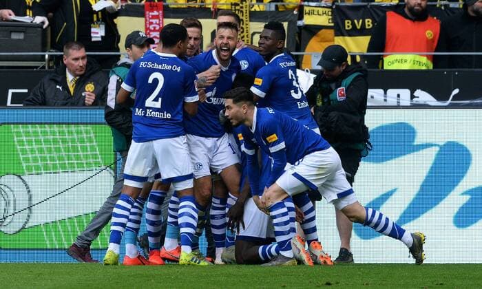 Sport Themen der Woche KW17 Sport Bilder des Tages Fussball, Bundesliga, Deutschland, Herren, Saison 2018 2019, 31. Spieltag, Signal Iduna Park Dortmund: Bor. Dortmund, BVB (gelb) - FC Schalke 04, S04 (blau); Jubel Schalke nach dem Tor zum 1:2 durch Salif Sane (S04). Jubel, Freude, Aktion. DFL REGULATIONS PROHIBIT ANY USE OF PHOTOGRAPHS AS IMAGE SEQUENCES AND OR QUASI-VIDEO. *** Football Bundesliga Germany Men Men Season 2018 2019 31 Matchday Signal Iduna Park Dortmund Bor Dortmund BVB yellow FC Schalke 04 S04 blue Cheers Schalke after the goal to 1 2 by Salif Sane S04 cheers joy action DFL REGULATIONS PROHIBIT ANY USE OF PHOTOGRAPHS AS IMAGE SEQUENCES AND OR QUASI VIDEO
