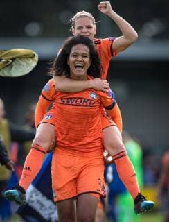 Wendie Renard & Eug?nie Le Sommer of Olympique Lyonnais Feminin (FC Lyon) at full time during the UEFA Women s Champions League semi-final 2nd leg match between Chelsea Women and Olympique Lyonnais Feminin at the Cherry Red Records Stadium, Kingston, England on 28 April 2019. Copyright: xAndyxRowlandx PMI-2789-0008