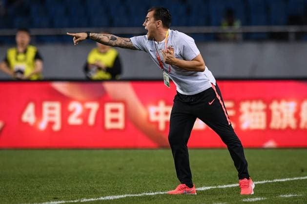 Head coach Fabio Cannavaro of Guangzhou Evergrande Taobao shouts instructions to his players as they compete against Chongqing SWM in their 7th round match during the 2019 Chinese Football Association Super League (CSL) in Chongqing, China, 28 April 2019. Guangzhou Evergrande Taobao defeated Chongqing SWM 1-0. Guangzhou Evergrande Taobao beats Chongqing SWM at 7th round match of 2019 CSL  20190428_307040