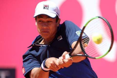 April 29, 2019 - Estoril, Portugal - Mackenzie McDonald of USA returns a ball to Yoshihito Nishioka of Japan during the Millennium Estoril Open - Day 1 - ATP Tennis Herren 250 tennis tournament at the Clube de Tenis do Estoril in Estoril, Portugal on April 29, 2019. Estoril Open 2019 - Day 1  - ZUMAn230 20190429_zaa_n230_174 Copyright: xPedroxFiuzax