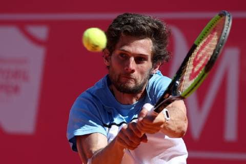 April 29, 2019 - Estoril, Portugal - Pedro Sousa of Portugal returns a ball to Reilly Opelka of USA during the Millennium Estoril Open - Day 1 - ATP Tennis Herren 250 tennis tournament at the Clube de Tenis do Estoril in Estoril, Portugal on April 29, 2019. Estoril Open 2019 - Day 1  - ZUMAn230 20190429_zaa_n230_236 Copyright: xPedroxFiuzax