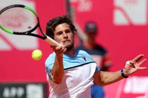 April 29, 2019 - Estoril, Portugal - Pedro Sousa of Portugal returns a ball to Reilly Opelka of USA during the Millennium Estoril Open - Day 1 - ATP Tennis Herren 250 tennis tournament at the Clube de Tenis do Estoril in Estoril, Portugal on April 29, 2019. Estoril Open 2019 - Day 1  - ZUMAn230 20190429_zaa_n230_244 Copyright: xPedroxFiuzax