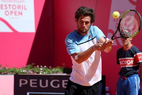 April 29, 2019 - Estoril, Portugal - Pedro Sousa of Portugal returns a ball to Reilly Opelka of USA during the Millennium Estoril Open - Day 1 - ATP Tennis Herren 250 tennis tournament at the Clube de Tenis do Estoril in Estoril, Portugal on April 29, 2019. Estoril Open 2019 - Day 1  - ZUMAn230 20190429_zaa_n230_250 Copyright: xPedroxFiuzax