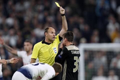 (l-r) referee Antonio Mateu Lahoz , Nico Tagliafico of Ajax during the UEFA Champions League semi final match between Tottenham Hotspur FC and Ajax Amsterdam at the Tottenham Hotspur stadium on April 30, 2019 in London, United Kingdom UEFA Champions League 2018 2019 xVIxVIxImagesx xMauricexvanxSteenxIVx 14335422