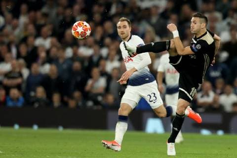 30th April 2019, Tottenham Hotspur Stadium, London, England; UEFA Champions League football, semi final 1st leg, Tottenham Hotspur versus Ajax; Dusan Tadic of Ajax clears the ball from Eriksen  ActionPlus12129094 ShaunxBrooks