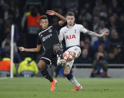 Kieran Trippier of Tottenham tackled by David Neres of Ajax during the UEFA Champions League match at the Tottenham Hotspur Stadium, London. Picture date: 30th April 2019. Picture credit should read: David Klein Sportimage EDITORIAL USE ONLY. No use with unauthorised audio, video, data, fixture lists, club league logos or live services. Online in-match use limited to 120 images, no video emulation. No use in betting, games or single club league player publications. SPI-0063-0115