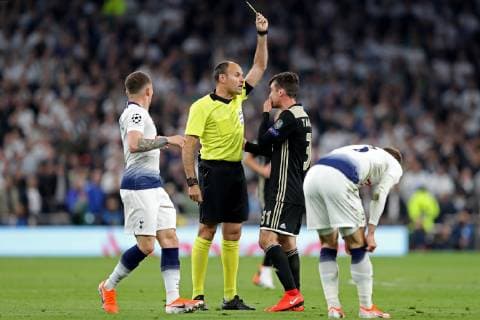 April 30, 2019 - London, England, United Kingdom - Ajax defender Nicolas Tagliafico is shown the yellow card by Referee Antonio Mateu Lahoz during the UEFA Champions League match between Tottenham Hotspur and Ajax Amsterdam at White Hart Lane, London on Tuesday 30th April 2019. Tottenham Hotspur v Ajax - UEFA Champions League Semi Final: First Leg  - ZUMAn230 20190430_zaa_n230_411 Copyright: xMixNewsx