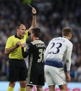 Tottenham Hotspur v Ajax Amsterdam UEFA Champions League Nicolas Tagliafico of Ajax gets a yellow card from Referee Antonio Mateu Lahoz during the UEFA Champions League Semi-final match at Tottenham Hotspur Stadium, London Content Not Available For UK Newspapers Copyright: xPaulxChestertonx FIL-13184-0066