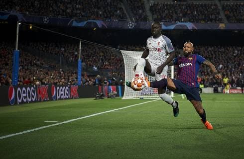 Soccer: UEFA Champions League 2018 19 : Arturo Vidal (R) of Barcelona competes for the ball with Sadio Mane of Liverpool during the UEFA Champions League Match between FC Barcelona Barca vs Liverpool FC at Camp Nou Stadium in Barcelona, Spain, May 1, 2019. Noxthirdxpartyxsales  (102332776)