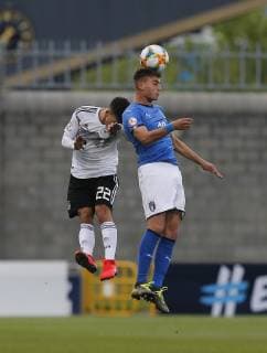 4th May 2019, Tallaght Stadium, Dublin, Ireland; UEFA Under 17 European Football Championships, Italy versus Germany; Sebastiano Esposito of Italy U17 U 17 wins the header from Mehmet-Can Aydin of Germany U17  ActionPlus12130901 PeterxFitzpatrick