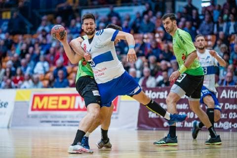 Yannick Dräger 19 TV Emsdetten Jonas Hoenicke 20 Dessau Rosslauer HV 06 Janko Bozovic 77 TV Emsdetten during the match in Handball 2 Bundesliga Men Season 2018 2019 between Dessau Rosslauer HV 06 and TV Emsdetten in the Anhalt Arena on 5 May 2019 in Dessau Rosslau Sachsen Anhalt Germany