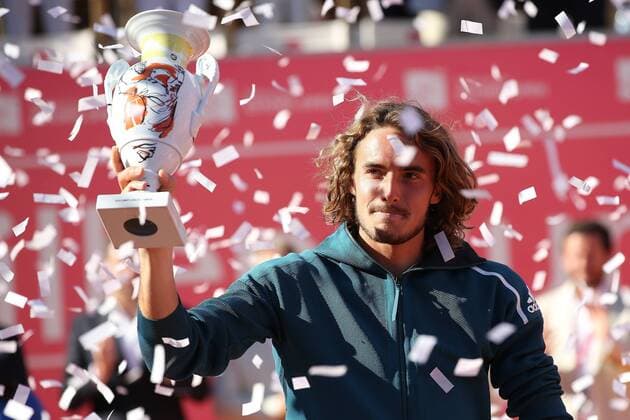 Sport Themen der Woche KW18 Sport Bilder des Tages May 5, 2019 - Estoril, Portugal - Stefanos Tsitsipas of Greece raises the trophy after winning the Millennium Estoril Open Final ATP Tennis Herren 250 tennis tournament against Pablo Cuevas of Uruguay, at the Clube de Tenis do Estoril in Estoril, Portugal on May 5, 2019. Estoril Open 2019 - Day 7  - ZUMAn230 20190505_zaa_n230_316 Copyright: xPedroxFiuzax