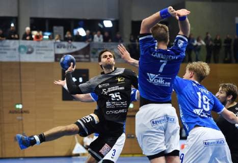 on ball Sebastian Greß Dresden against Moritz Lambrecht 7 and Markus Stegefelt both Hüttenberg HC Elbflorenz Dresden against TV Hüttenberg Handball 2 League of the Men 2 Bundesliga Season 2018 2019 Dresden BallsportARENA Dresden 05 05 2019