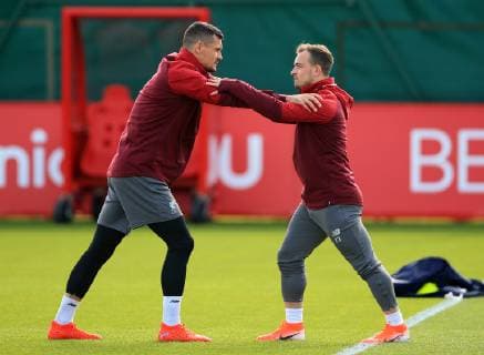 6th May 2019, Anfield, Liverpool, England; UEFA Champions League football, Liverpool versus Barcelona pre match training ahead of the second leg at Melwood; Dejan Lovren warms up with team mate Xherdan Shaqiri of Liverpool  ActionPlus12131938 DavidxBlunsden