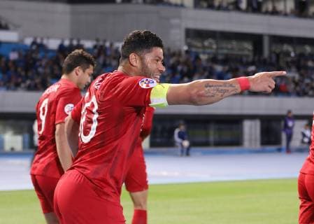 (190507) -- KAWASAKI, May 7, 2019 (Xinhua) -- Hulk (front) of China s Shanghai SIPG FC celebrates scoring during the Group H match between China s Shanghai SIPG FC and Japan s Kawasaki Frontale at the 2019 AFC Champions League in Kawasaki, Japan, May 7, 2019. (Xinhua Du Xiaoyi) (SP)JAPAN-KAWASAKI-SOCCER-AFC CHAMPIONS LEAGUE-GROUP H 