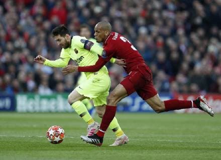 Liverpool s Fabinho tussles with Barcelona s Lionel Messi during the UEFA Champions League match at Anfield, Liverpool. Picture date: 7th May 2019. Picture credit should read: Darren Staples Sportimage EDITORIAL USE ONLY. No use with unauthorised audio, video, data, fixture lists, club league logos or live services. Online in-match use limited to 120 images, no video emulation. No use in betting, games or single club league player publications. SPI-0072-0035