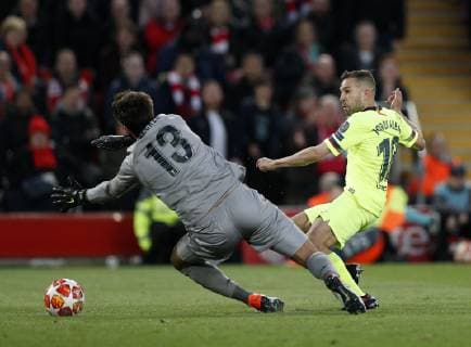 Liverpool s Alisson saves from Barcelona s Jordi Alba during the UEFA Champions League match at Anfield, Liverpool. Picture date: 7th May 2019. Picture credit should read: Darren Staples Sportimage EDITORIAL USE ONLY. No use with unauthorised audio, video, data, fixture lists, club league logos or live services. Online in-match use limited to 120 images, no video emulation. No use in betting, games or single club league player publications. SPI-0072-0046