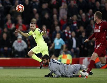 Liverpool s Alisson saves from Barcelona s Jordi Alba during the UEFA Champions League match at Anfield, Liverpool. Picture date: 7th May 2019. Picture credit should read: Darren Staples Sportimage EDITORIAL USE ONLY. No use with unauthorised audio, video, data, fixture lists, club league logos or live services. Online in-match use limited to 120 images, no video emulation. No use in betting, games or single club league player publications. SPI-0072-0047
