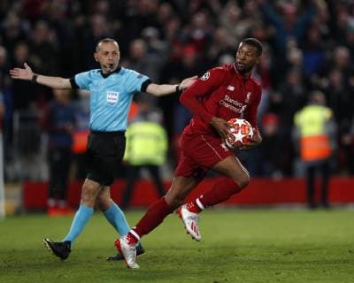 Liverpool s Georginio Wijnaldum celebrates scoring his sides second goal during the UEFA Champions League match at Anfield, Liverpool. Picture date: 7th May 2019. Picture credit should read: Darren Staples Sportimage EDITORIAL USE ONLY. No use with unauthorised audio, video, data, fixture lists, club league logos or live services. Online in-match use limited to 120 images, no video emulation. No use in betting, games or single club league player publications. SPI-0072-0057